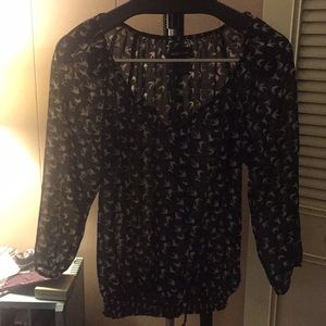 Blue blouse with white birds